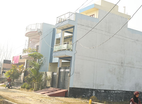 Contemporary luxury home exterior with large glass windows and modern design